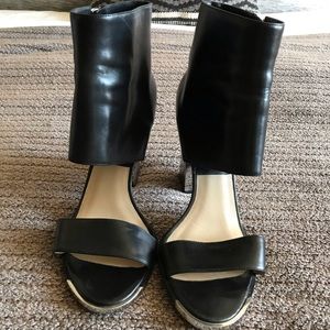 Michael Kors zip up heel / bootie in black leather